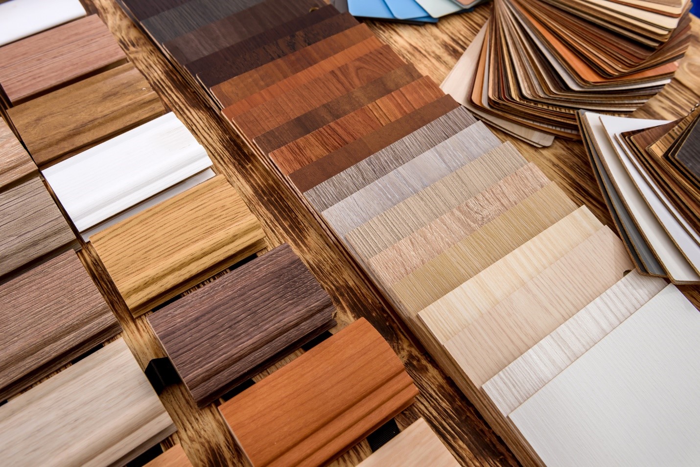 Various wood color and wood stain swaths are neatly spread out