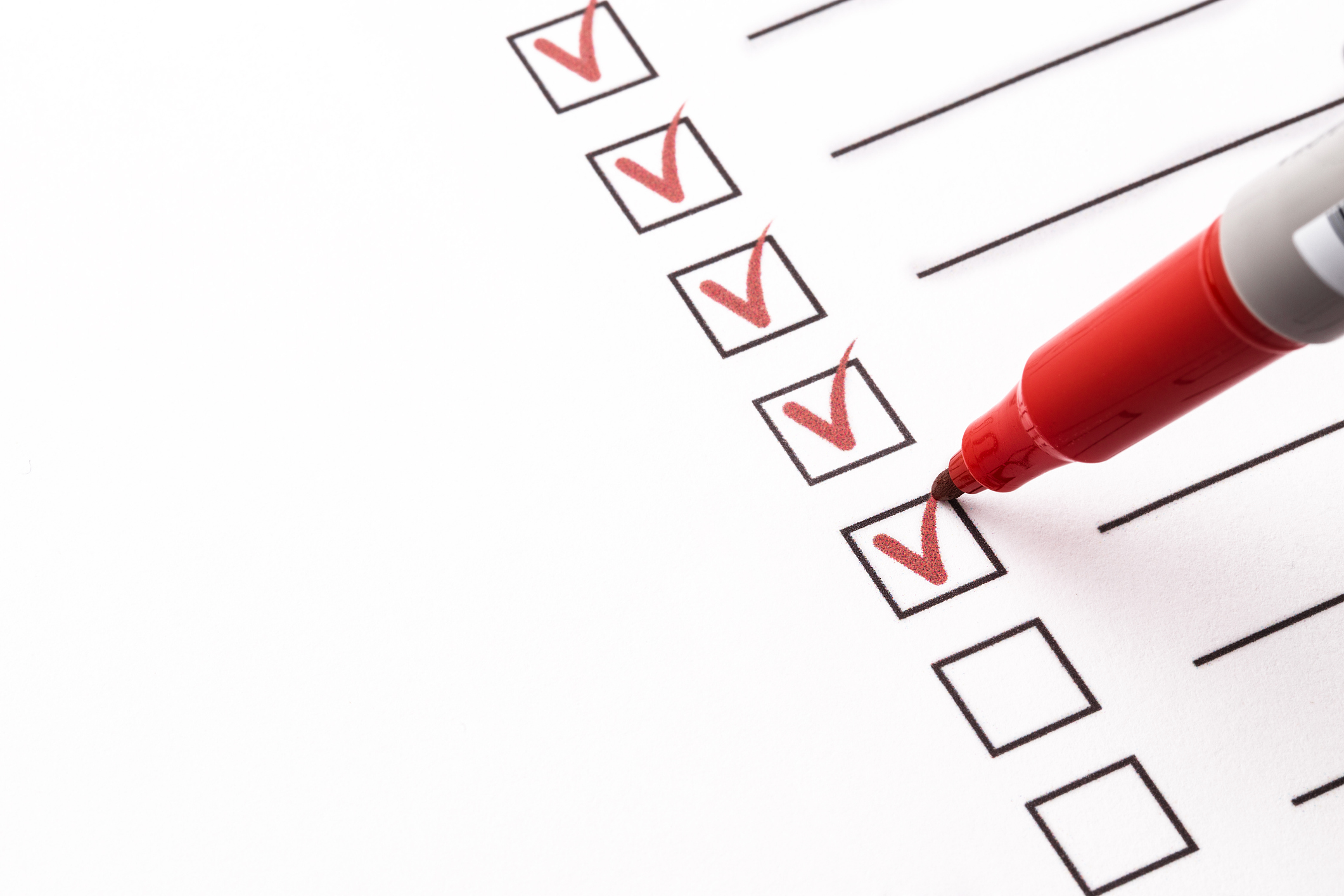 checklist marked with red sharpie