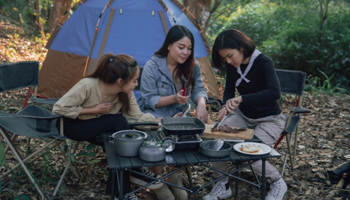Three women camping
