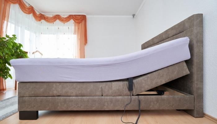 Adjustable bed with the head elevated