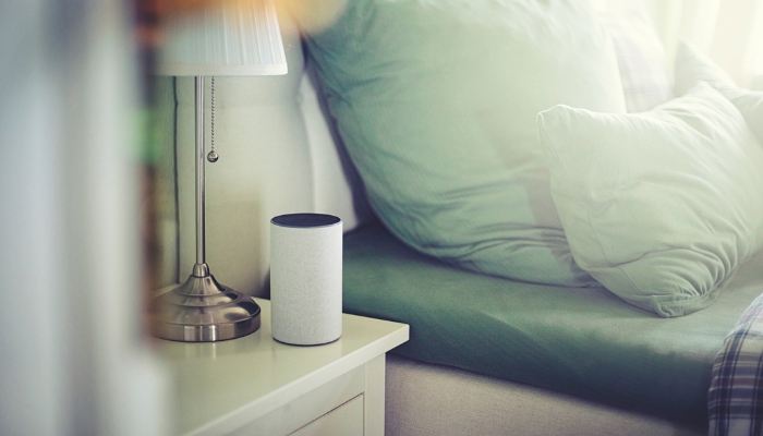 bluetooth speaker on bedside table
