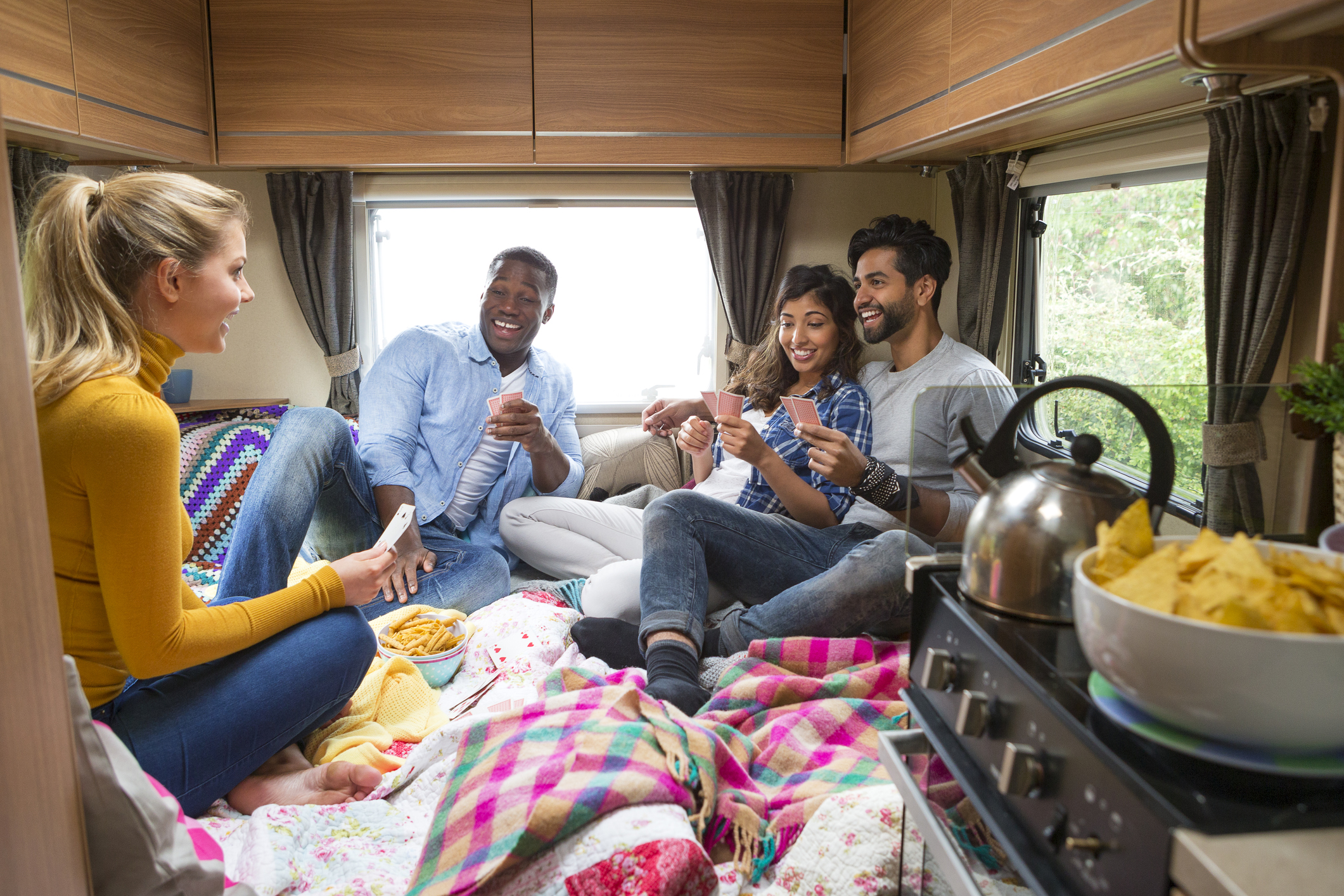 group of friends playing games in RV