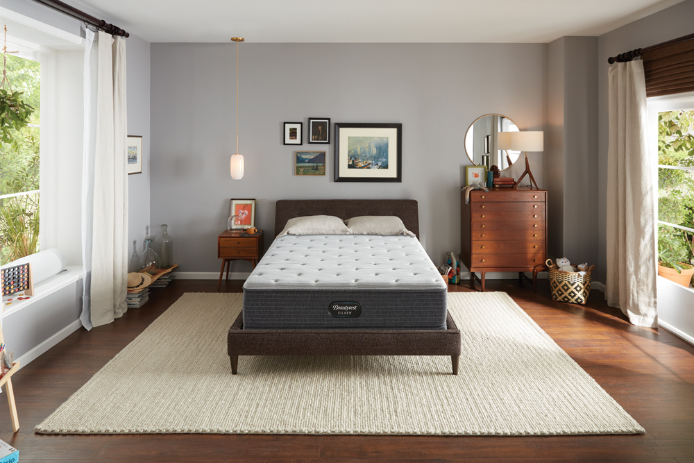 Bedroom staged with a Beautyrest silver mattress