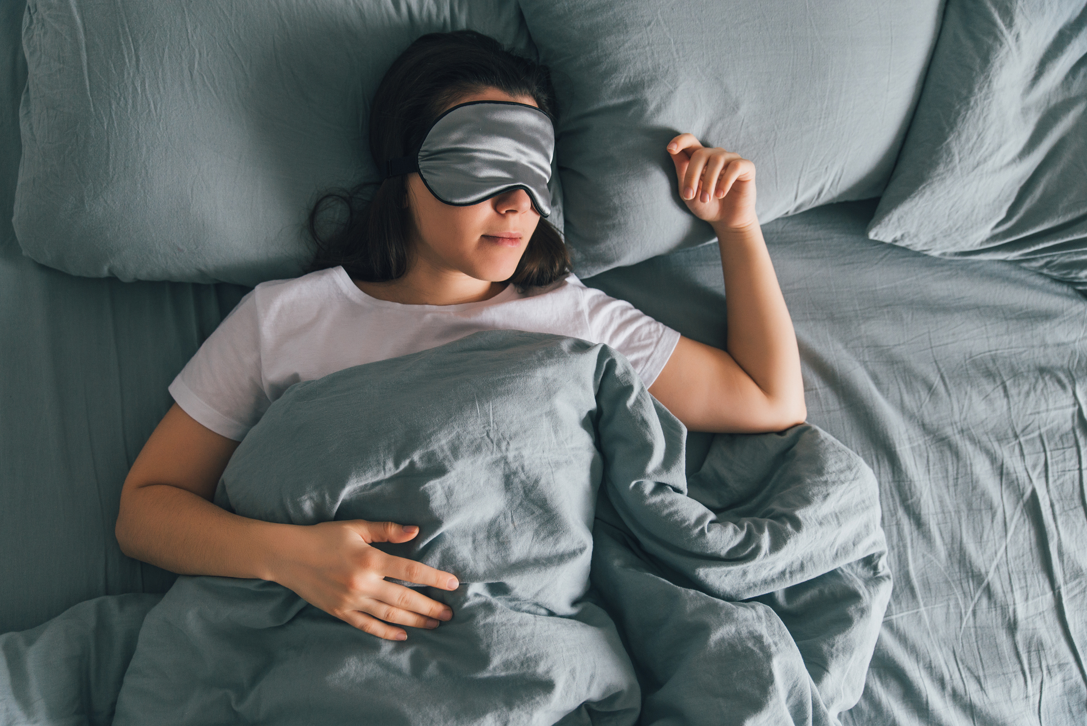 woman sleeping with eye cover on