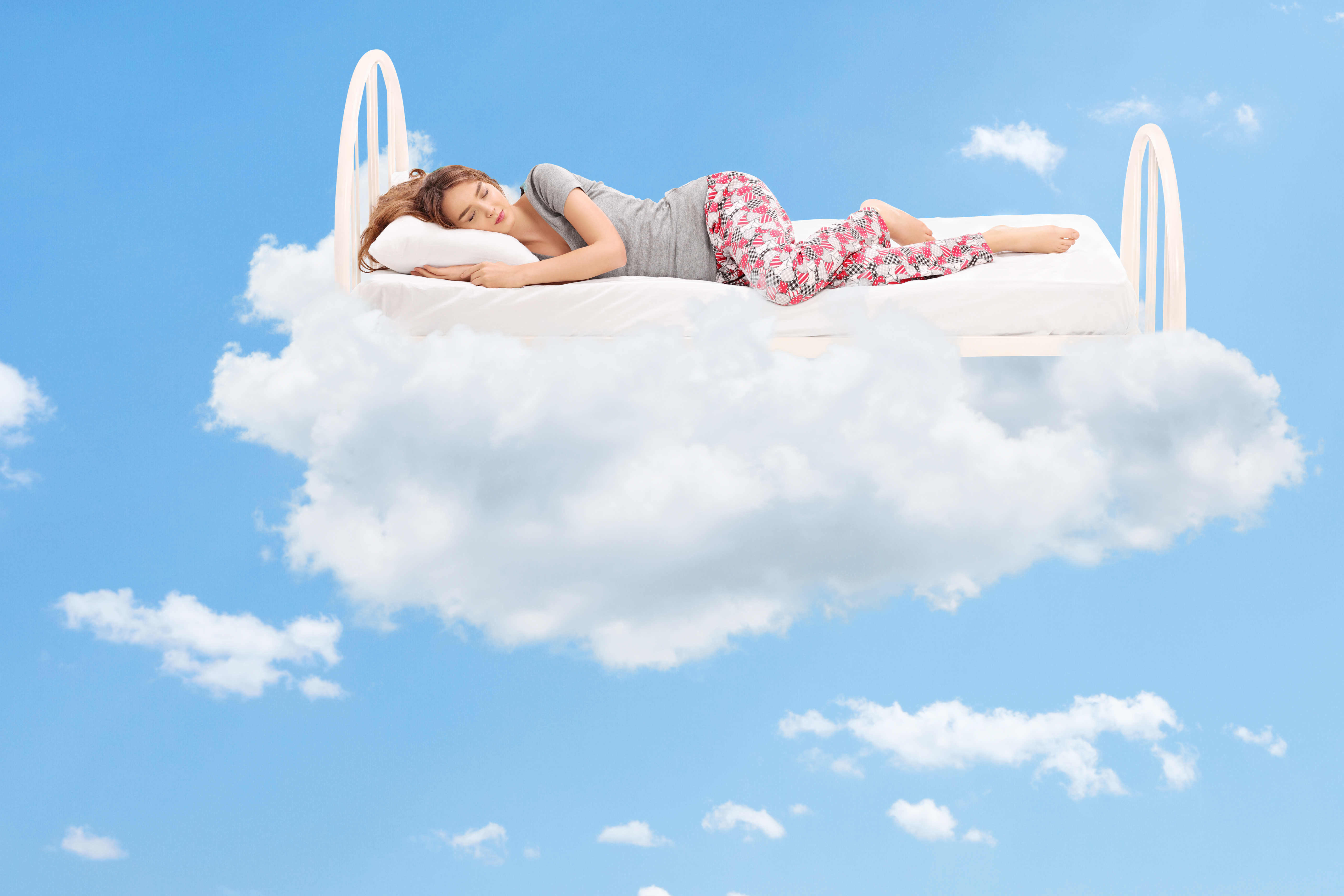 Woman sleeping on a cloud 