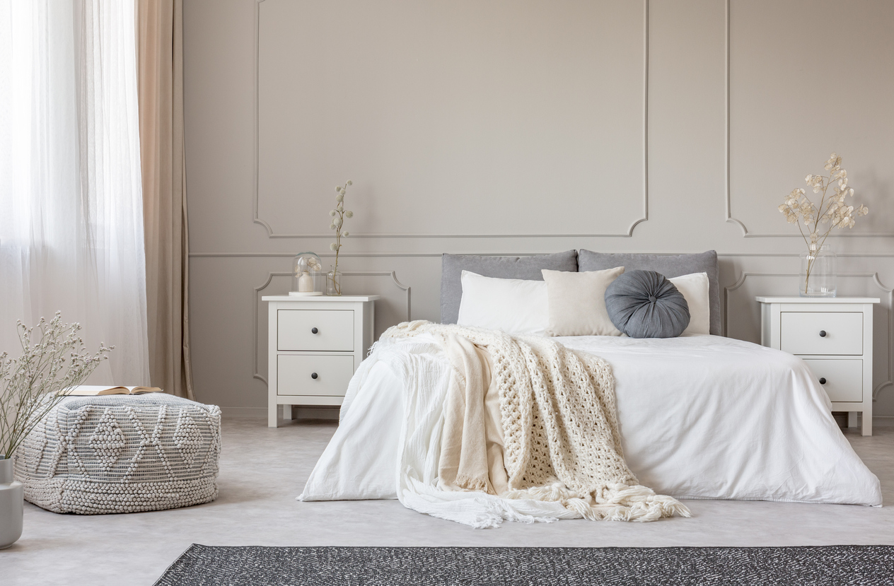 beige color scheme in bedroom with gray décor accents