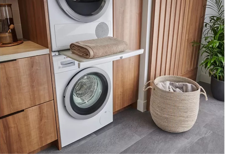 Bosch 500 series compact washer and dryer with pull out center shelf 