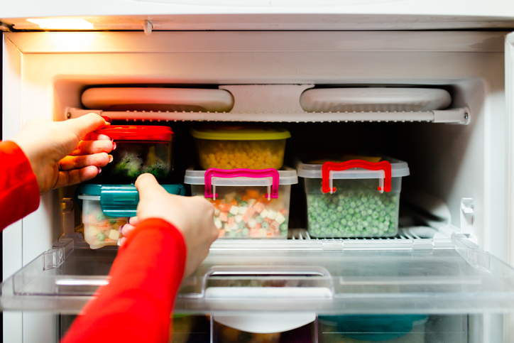 Close-up of frozen veggies in the freezer