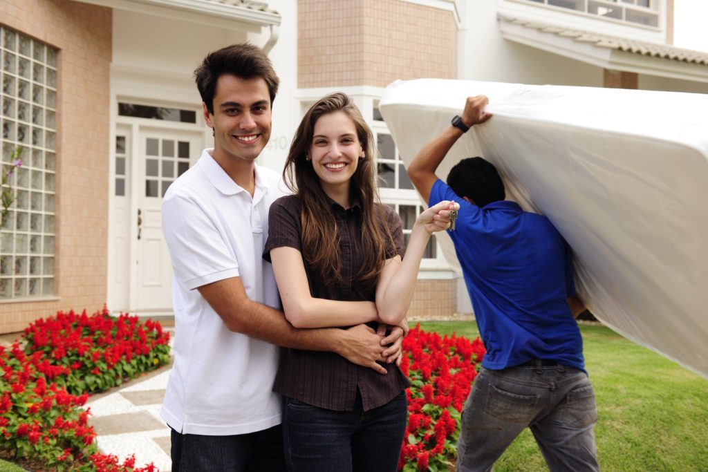 Young couple buying a mattress