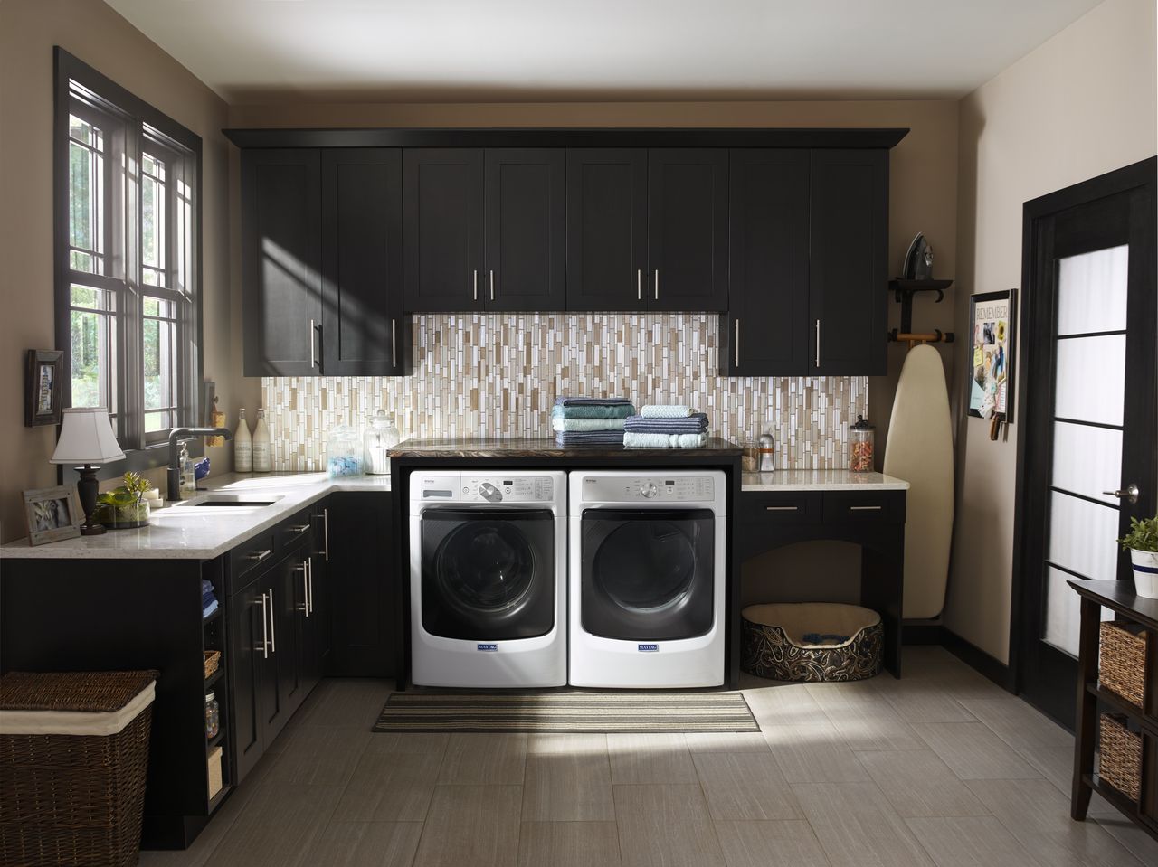 Maytag Front Load Washer and Dryer stowed under a counter.