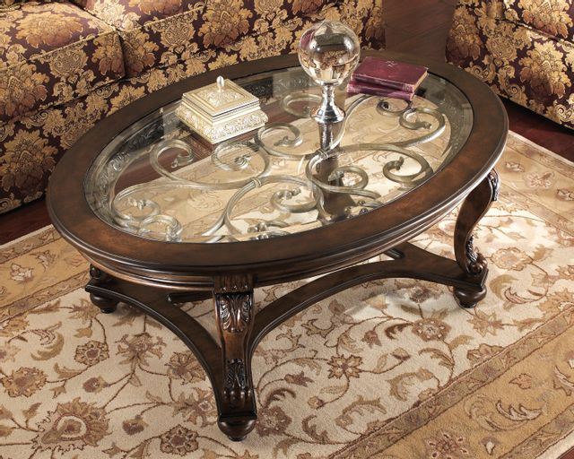 Signature Design by Ashley® Norcastle Dark Brown Oval Coffee Table 6