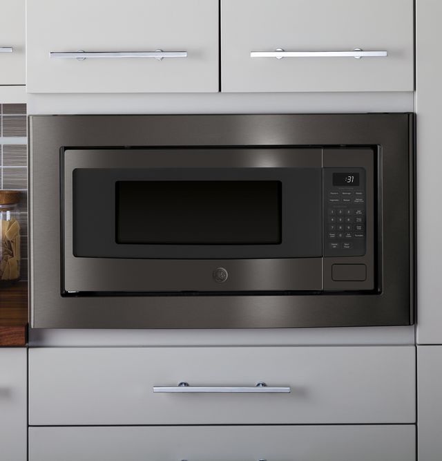 GE Profile™ 1.1 Cu. Ft. Black Stainless Steel Countertop Microwave 4