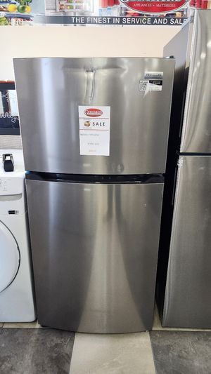 Frigidaire® 13.9 Cu. Ft. Brush Steel Top Freezer Refrigerator