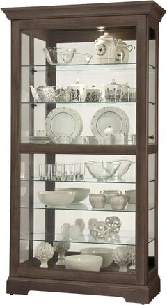 Howard Miller® Tyler VI Aged Auburn Curio Cabinet