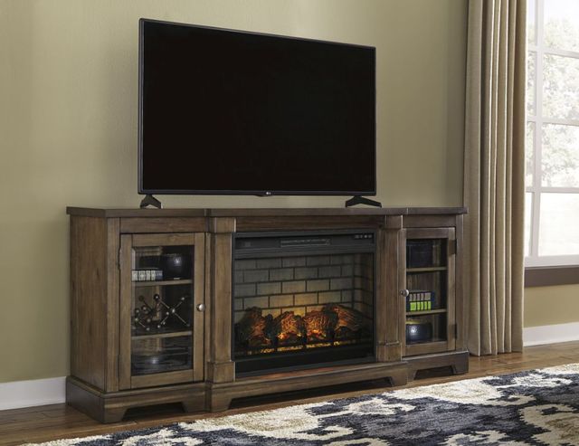 Signature Design by Ashley® Flynnter Medium Brown 75" TV Stand with Electric Fireplace 1