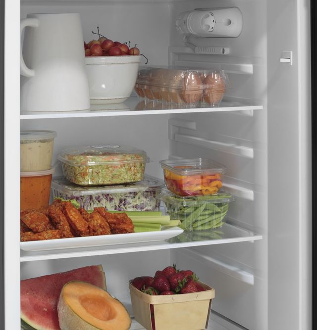 GE® 9.9 Cu. Ft. Black Top Freezer Refrigerator 7
