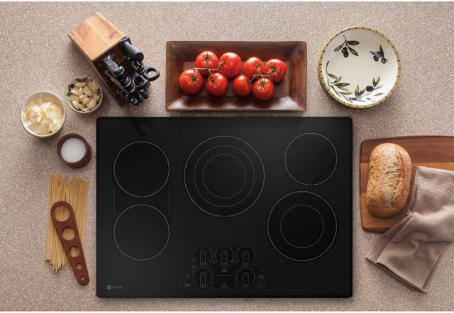 GE Profile™ 30" Stainless Steel/Black Built-In Electric Cooktop 4