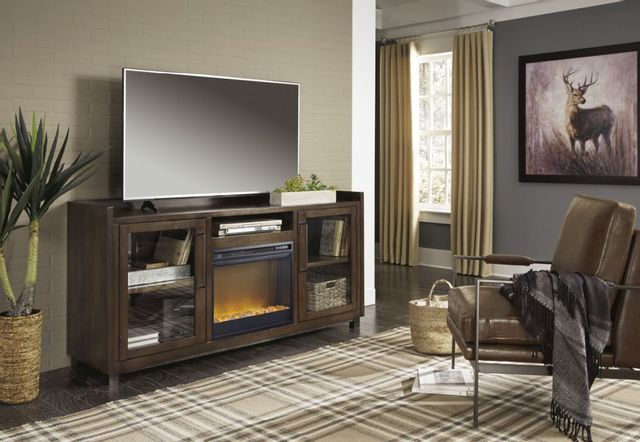 Signature Design by Ashley® Starmore Brown 70" TV Stand with Electric Fireplace 8