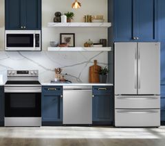 LG 4 Piece Kitchen Package with a 26.9 Cu. Ft. Capacity 4 Door French Door Refrigerator PLUS a FREE 10 PC Luxury Cookware Set