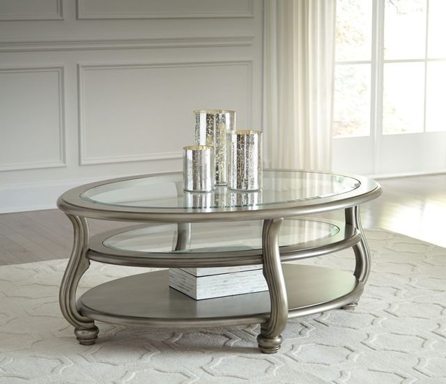 Signature Design by Ashley® Coralayne Silver Oval Coffee Table 1