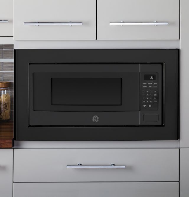 GE Profile™ 1.1 Cu. Ft. Black Slate Countertop Microwave 4