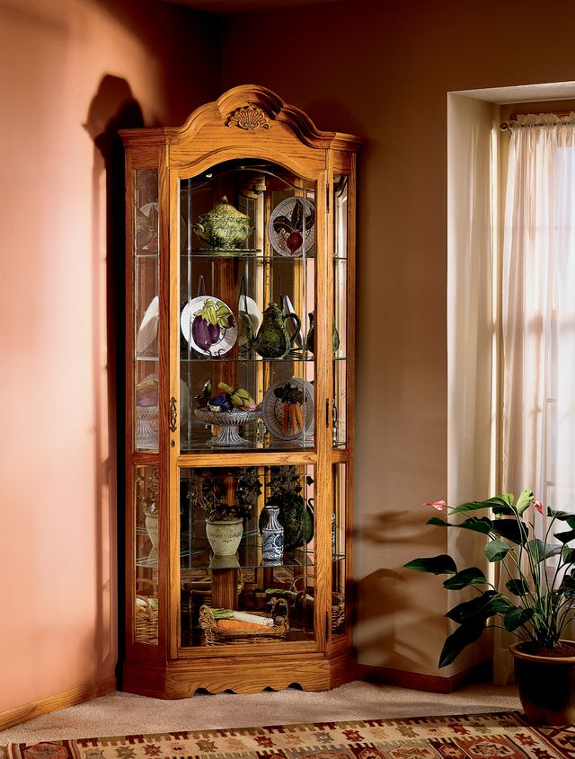 Howard Miller® Wilshire Golden Oak Curio Cabinet 1