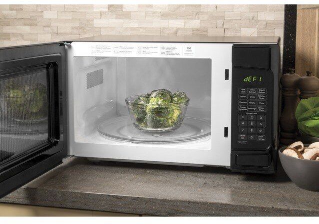 GE® 1.1 Cu. Ft. Black Countertop Microwave 3