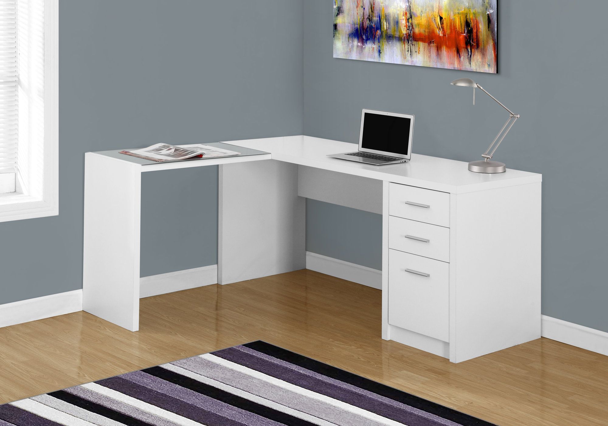 white desk laptop