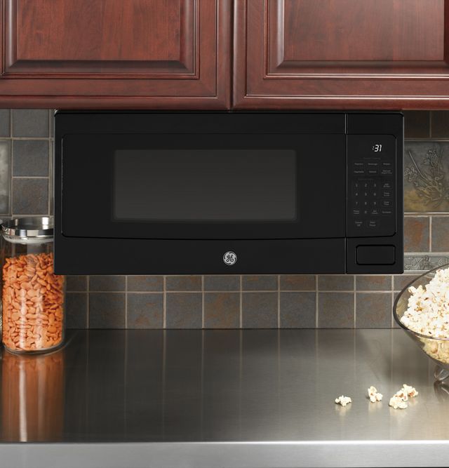 GE Profile™ 1.1 Cu. Ft. Black Countertop Microwave 4