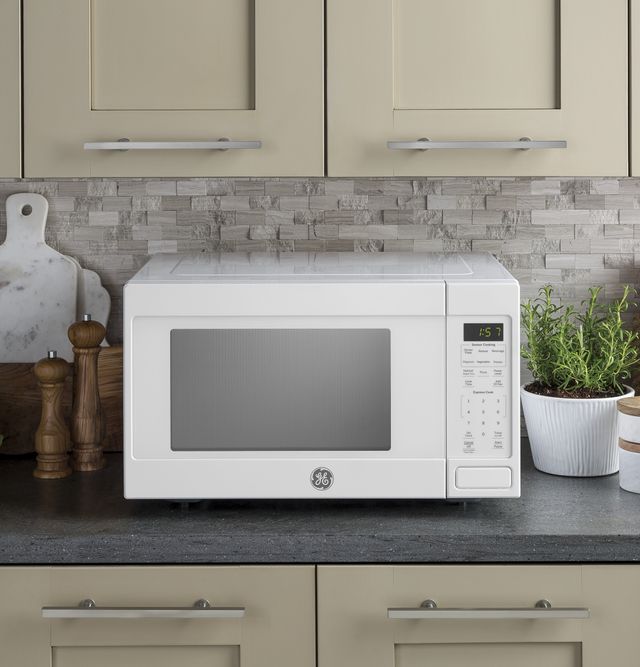 GE® 1.6 Cu. Ft. White Countertop Microwave-1