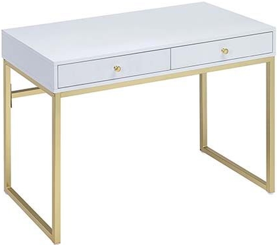 white desk with brass legs