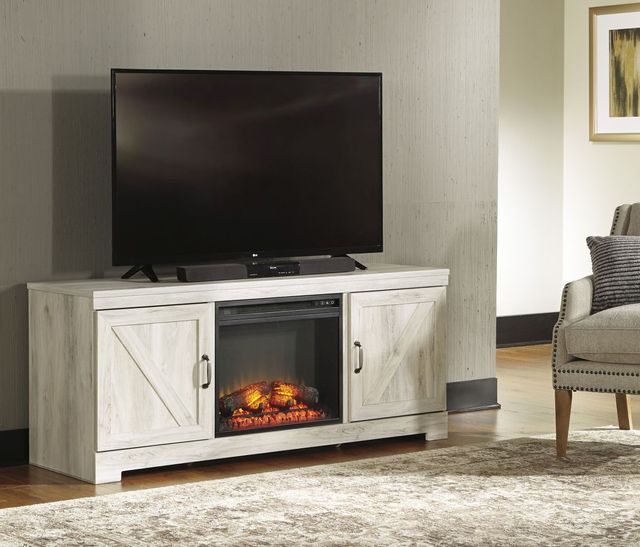 Signature Design by Ashley® Bellaby Whitewash 63" TV Stand with Electric Fireplace 5