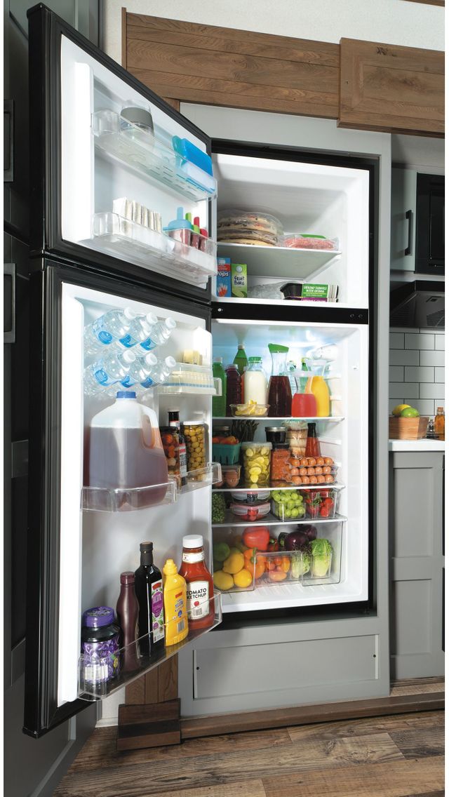 GE® 9.9 Cu. Ft. Stainless Steel Top Freezer Refrigerator 8