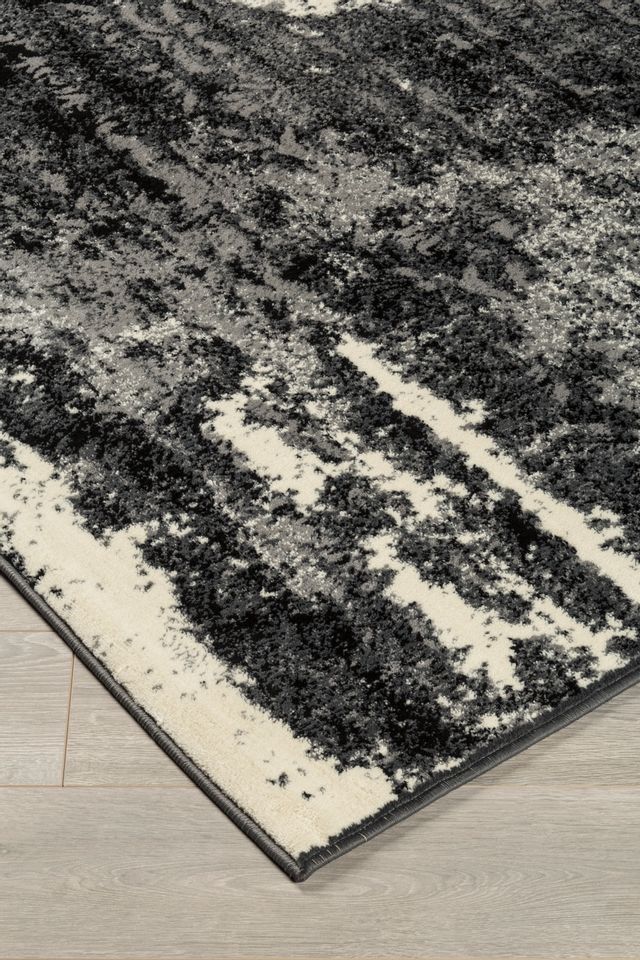 Moyen tapis décoratif de 1,52 m x 2,13 m de Signature Design by Ashley® Roskos - Noir/Gris 1