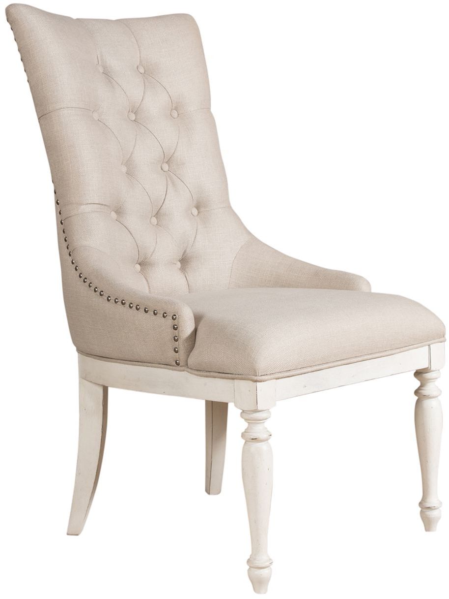 white upholstered chair