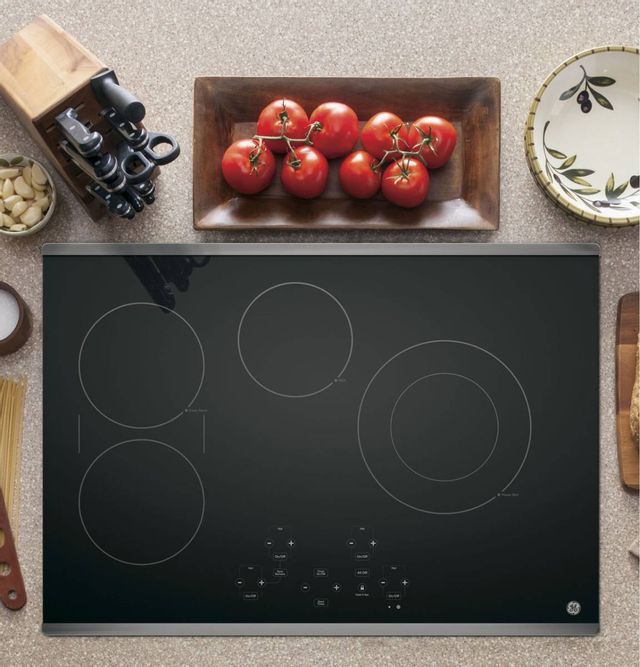 GE® 30" Stainless Steel on Black Electric Cooktop-3