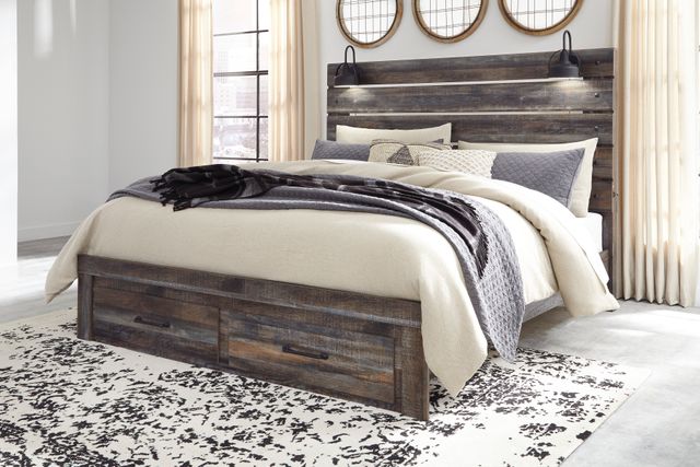Signature Design by Ashley® Drystan Brown King Panel Bed with Storage Footboard P06308147-1