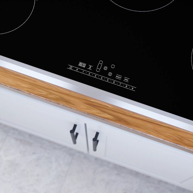 Bosch 800 Series 36" Black/Stainless Steel Electric Cooktop 6