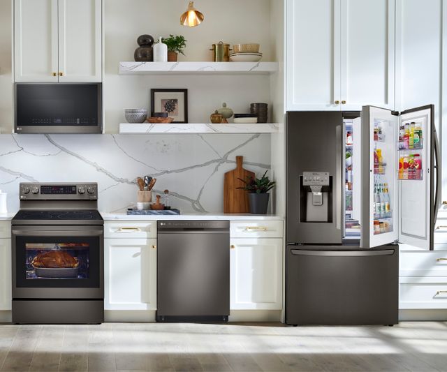 LG 4 Piece Kitchen Package with a 29.7 Cu. Ft. Capacity Smart French Door Craft Ice Refrigerator PLUS a FREE 5.8 cu. ft. Upright Freezer OR 6.9 cu. ft. All-Refrigerator!