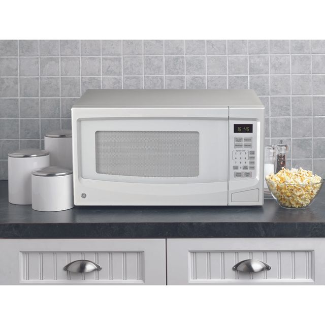 GE® 1.1 Cu. Ft. White Countertop Microwave 1