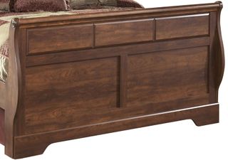 Signature Design by Ashley® Timberline Warm Brown Queen Sleigh Footboard