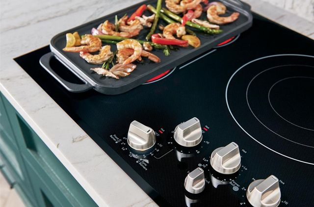 Café™ 36" Black / Brushed Stainless Electric Cooktop 8