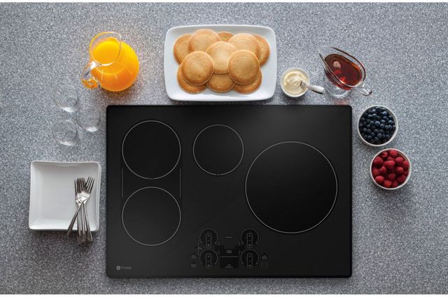 GE Profile™ 30" Black/Stainless Built-In Induction Cooktop 9
