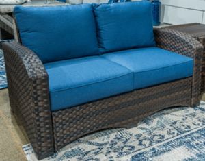 Signature Design by Ashley® Windglow Blue/Brown Outdoor Loveseat with Cushion