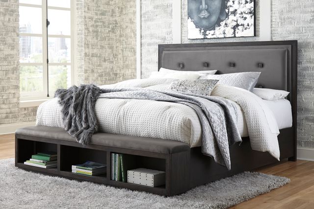 Signature Design by Ashley® Hyndell Dark Brown Queen Upholstered Storage Bed 1
