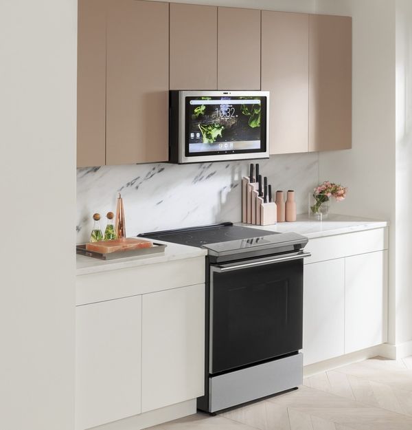 Kitchen featuring Café 30" Platinum Glass Slide in Induction Range