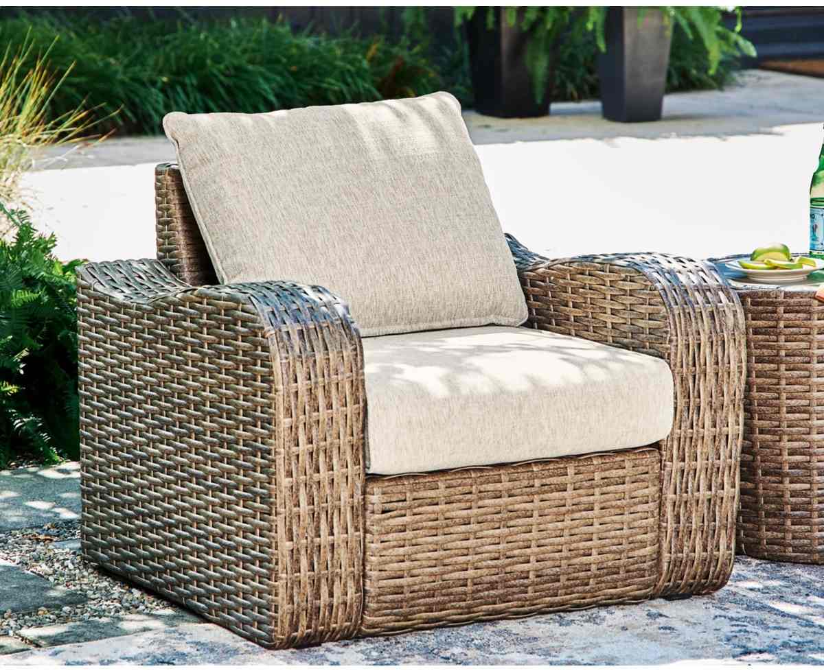 Signature Design by Ashley® Sandy Bloom Beige Outdoor Lounge Chair with ...