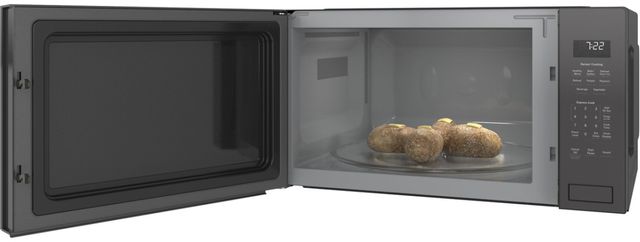 GE Profile™ 2.2 Cu. Ft. White Built In Microwave 14