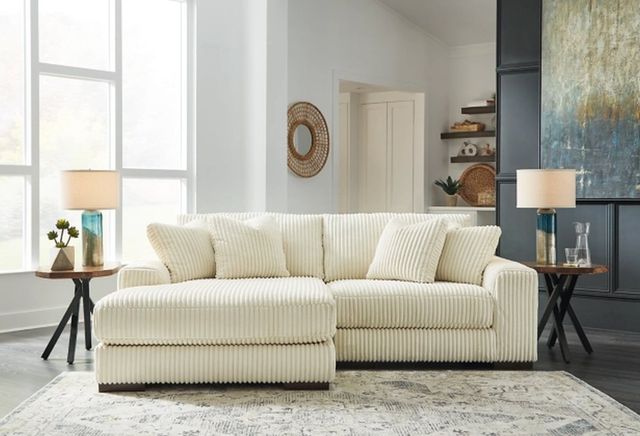Signature Design by Ashley® Lindyn 2-Piece Ivory Left-Arm Facing Sectional with Corner Chaise-1