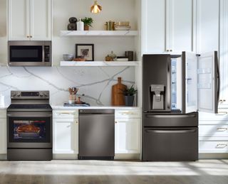LG 4 Piece Kitchen Package with a 29.5 Cu. Ft. Capacity 4 Door Smart French Door Refrigerator PLUS a FREE 5.8 cu. ft. Upright Freezer OR 6.9 cu. ft. All-Refrigerator! 